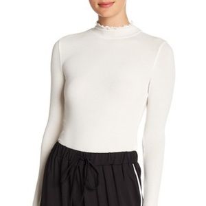 Ruffle Edged Knit Top